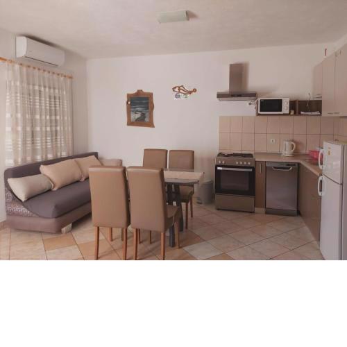 Apartment in Povlja with sea view, balcony, air conditioning WiFi 4936-1 -2 -3
