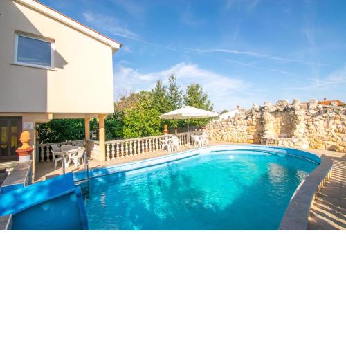 Apartment Uvo 2 with communal swimming pool