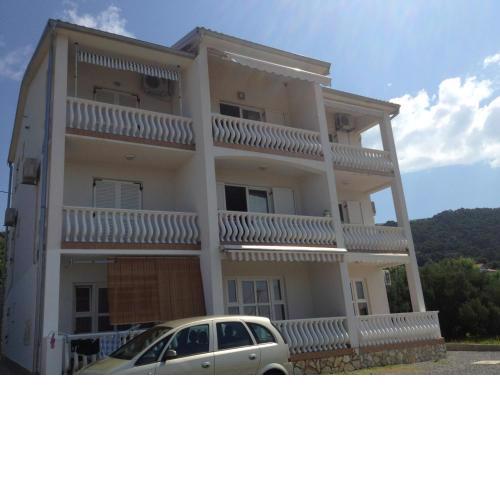 Apartments with a parking space Barbat, Rab - 11532