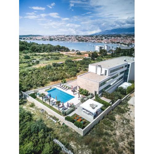 Family friendly apartments with a swimming pool Novalja, Pag - 15882