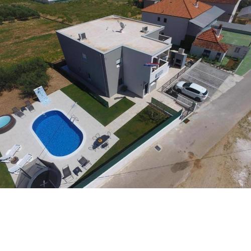 Family friendly apartments with a swimming pool Trogir - 20379