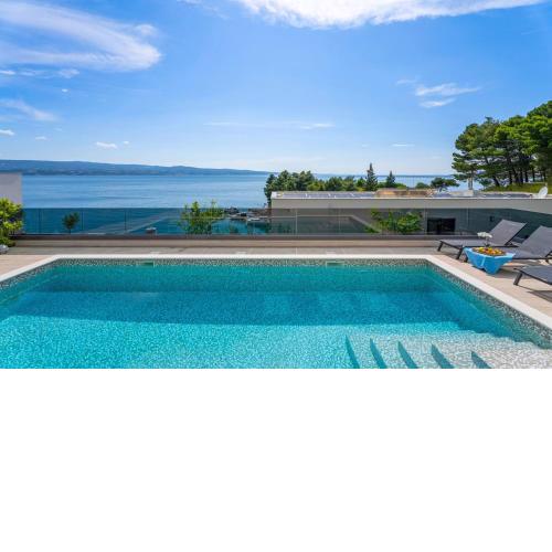 Luxury, seafront Villa IVAN with heated pool only 100m from beach